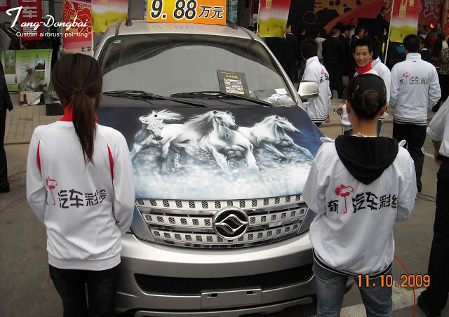 Custom airbrushed car with running horses artwork