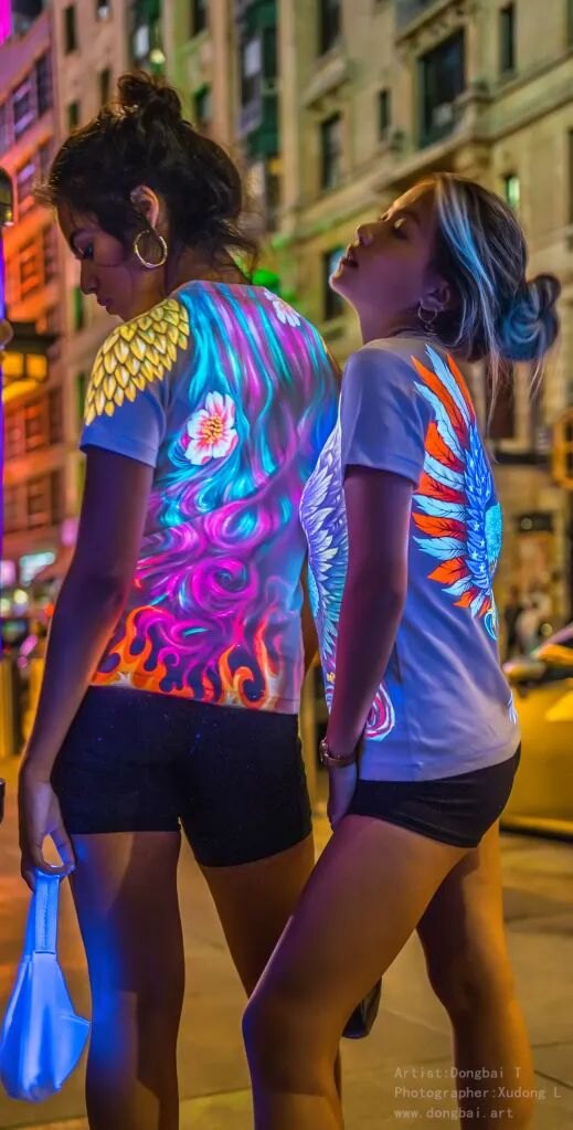 Glowing dragon UV t-shirt in the city at night