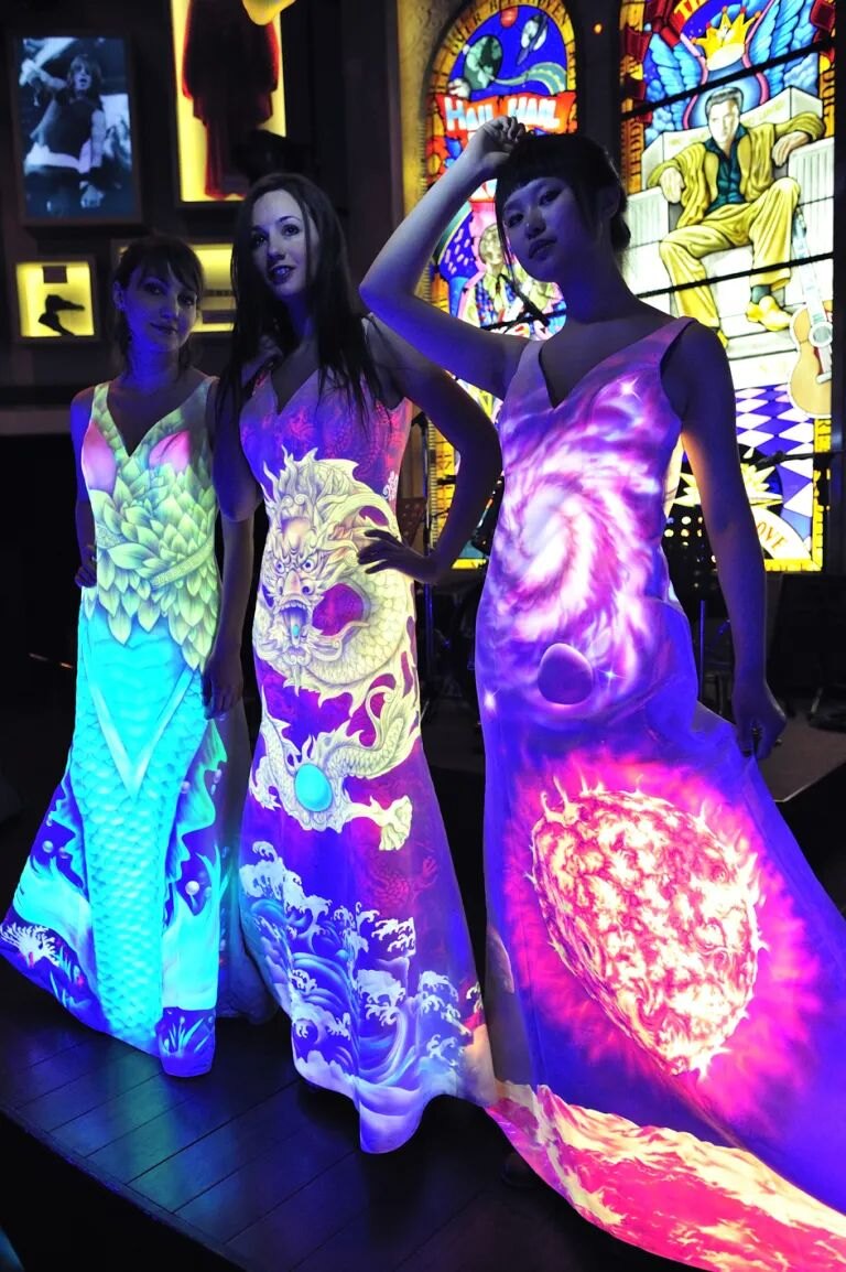 Hand-painted glowing dress glowing under UV light