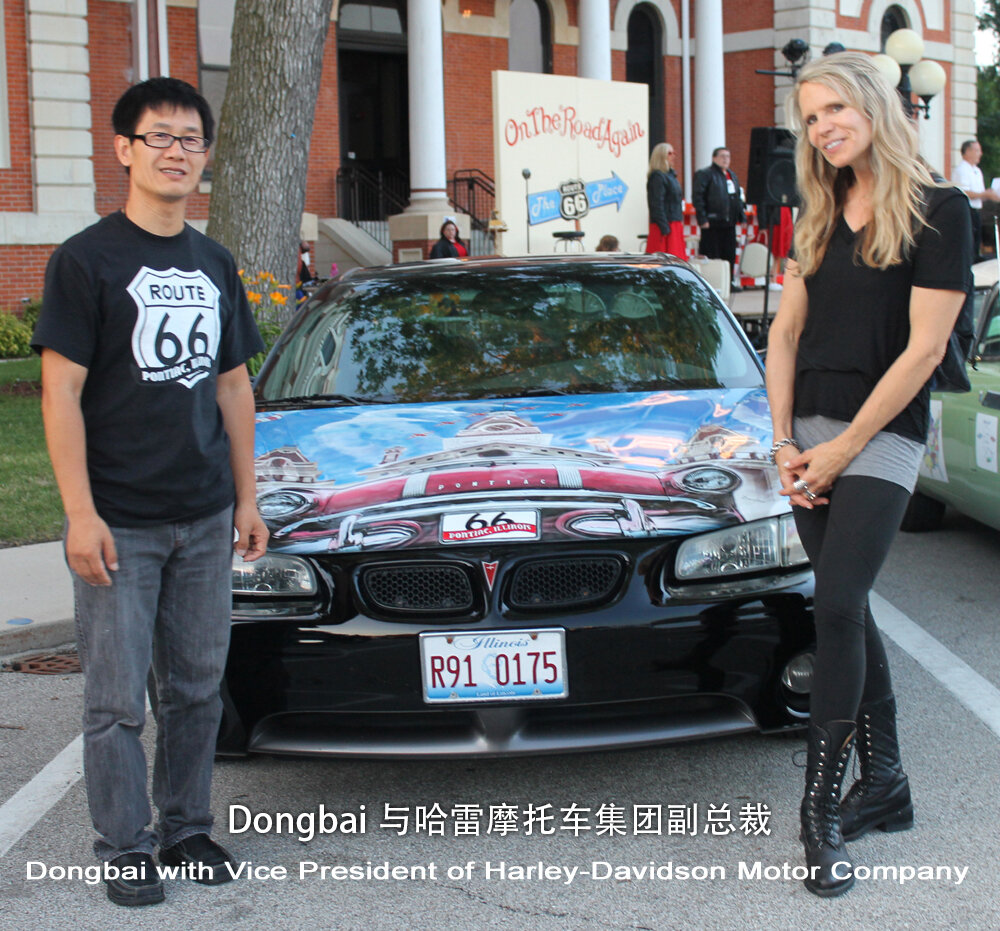 Dongbai Tang with the Vice President of Harley-Davidson Motor Company