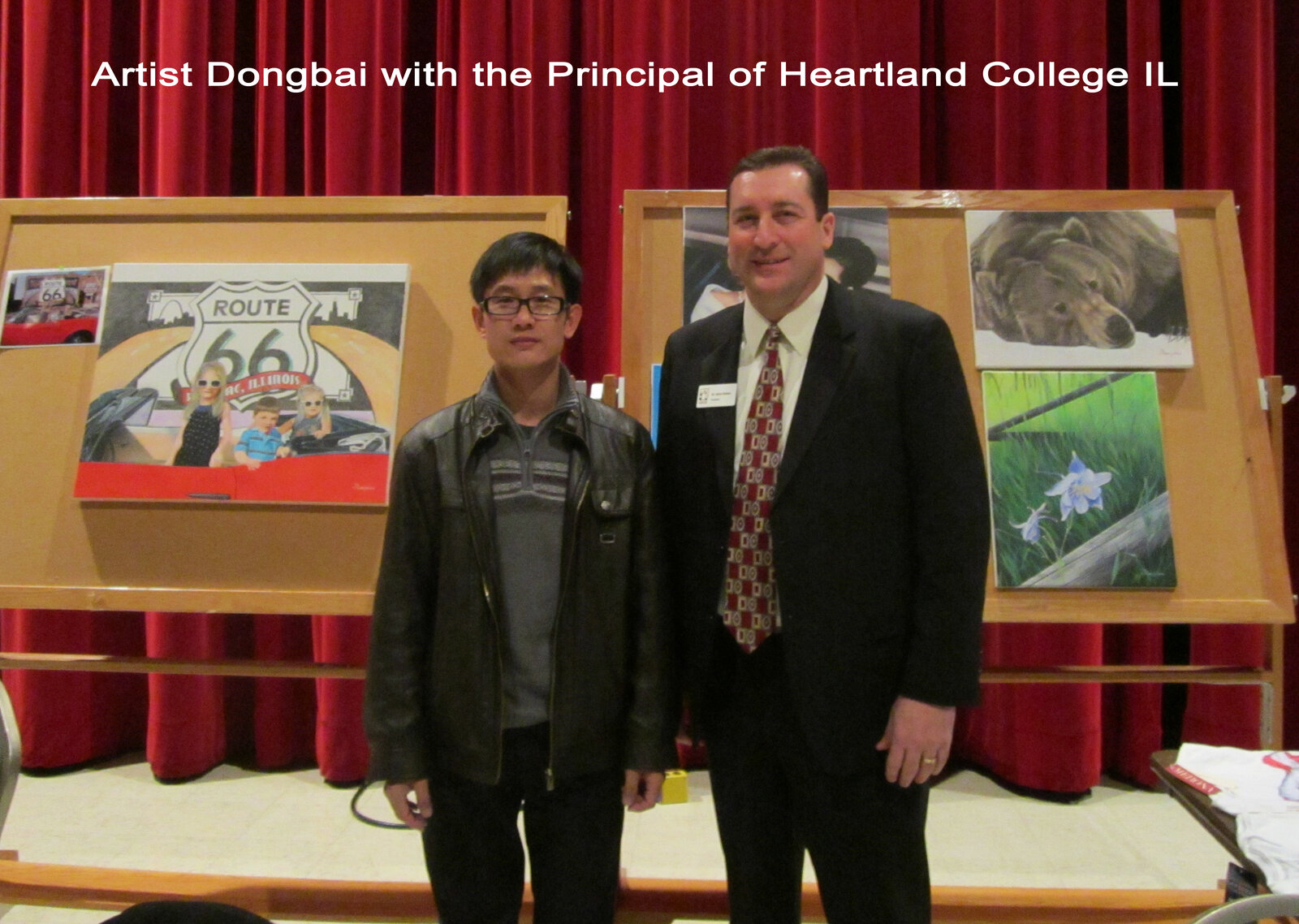 Artist Dongbai with the Principal of Heartland College, Illinois